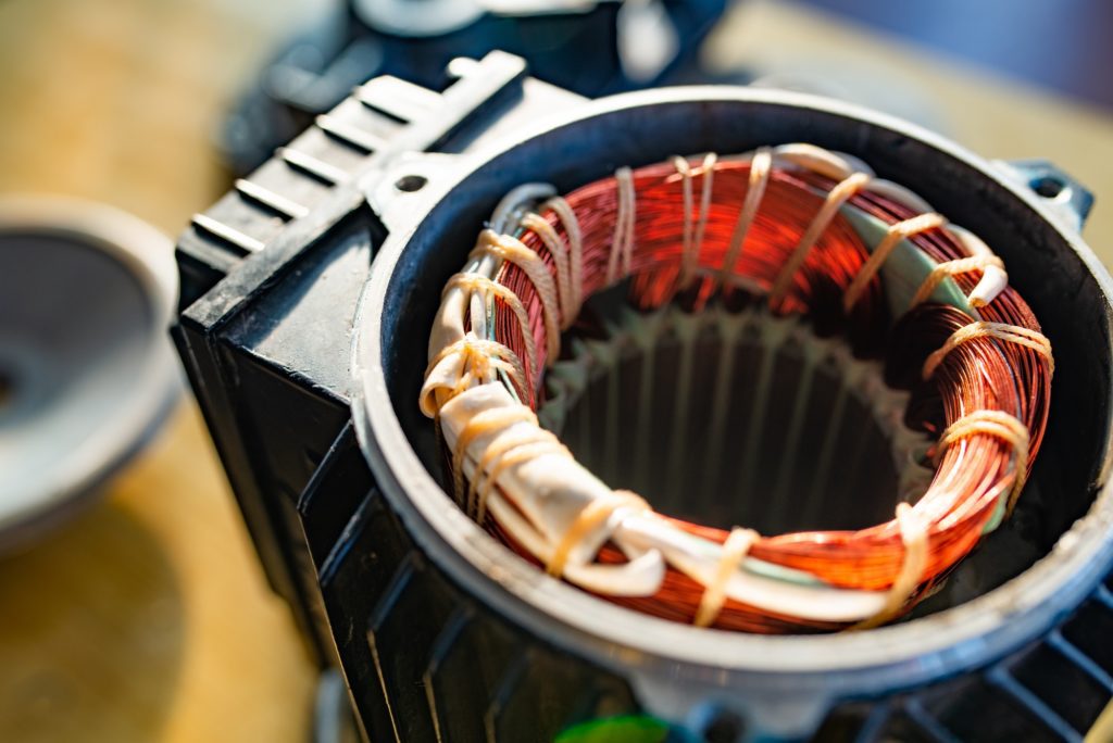 Close-up side view of a bundle of copper wire